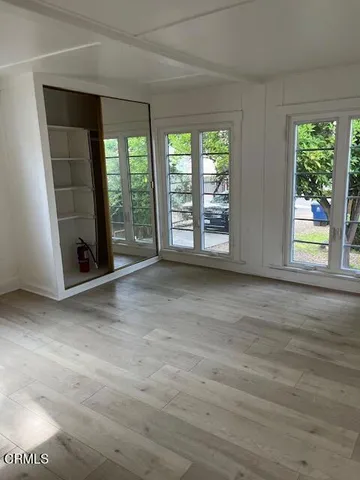 an empty room with windows