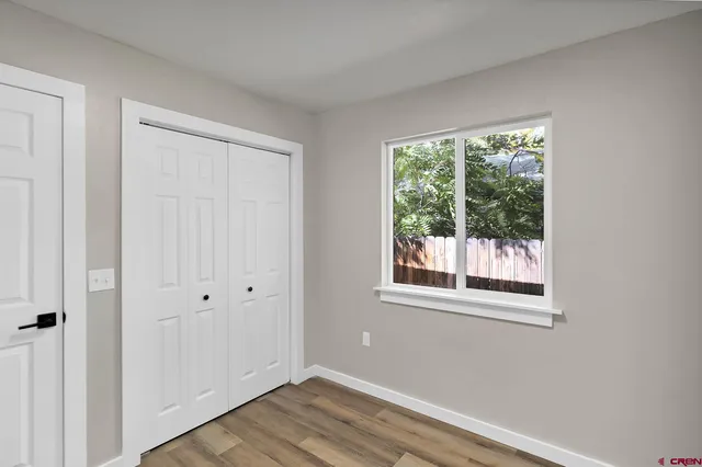 a view of a room that has a window in it