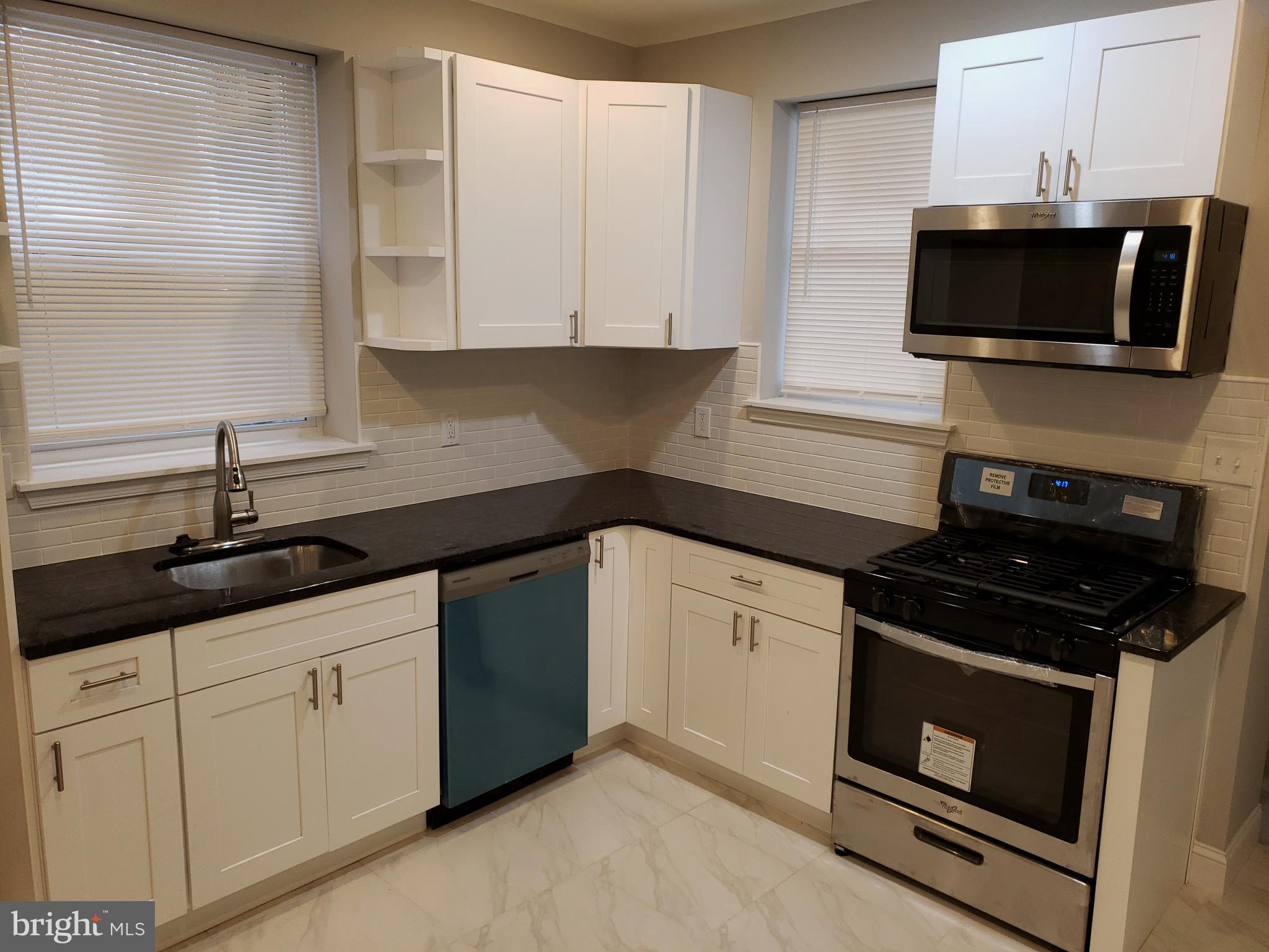 720 Wynnewood Road Philadelphia, PA 19151 - Photo 5 of 24 Beautiful Alpine White Brand New Kitchen!