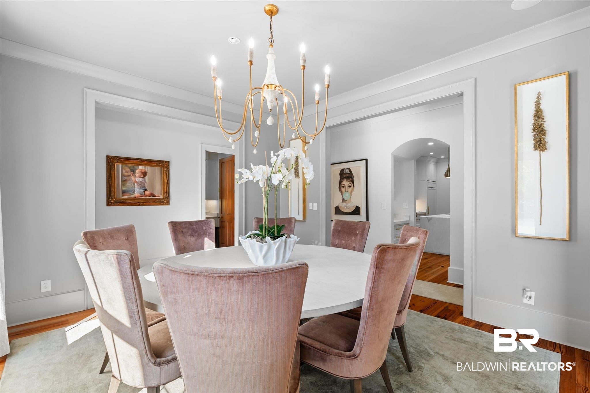 320 Long Court Mobile, AL 36608 - Photo 7 of 61 Dining room featuring wood-type flooring, a notable chandelier, and crown molding