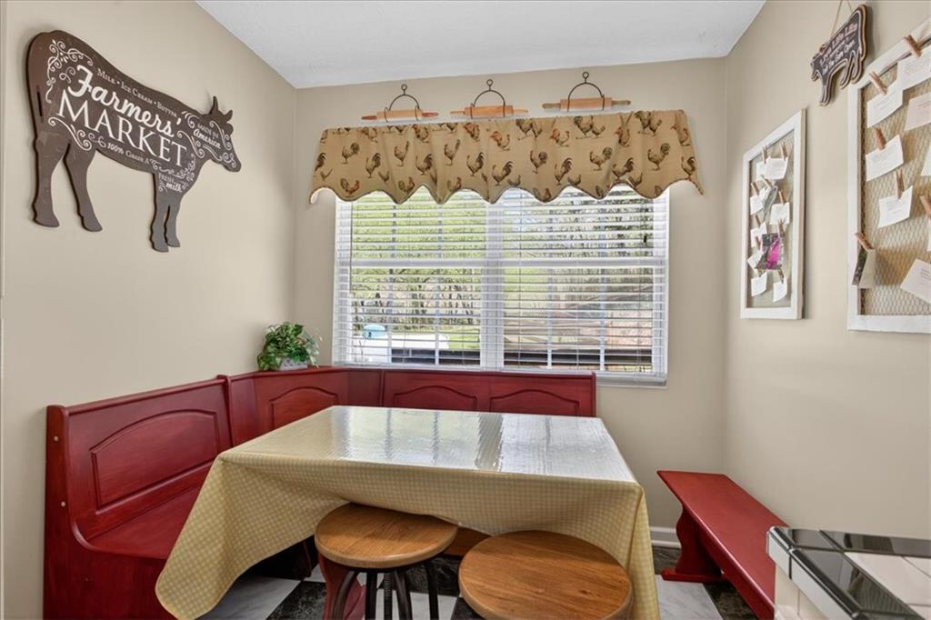 7433 Nicklesville Road Northeast Ranger, GA 30734 - Photo 19 of 53 a view of a dining room with furniture and a window