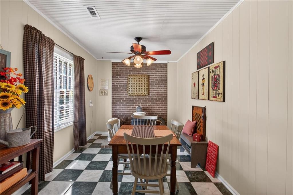 7433 Nicklesville Road Northeast Ranger, GA 30734 - Photo 20 of 53 a view of a dining room with furniture and window