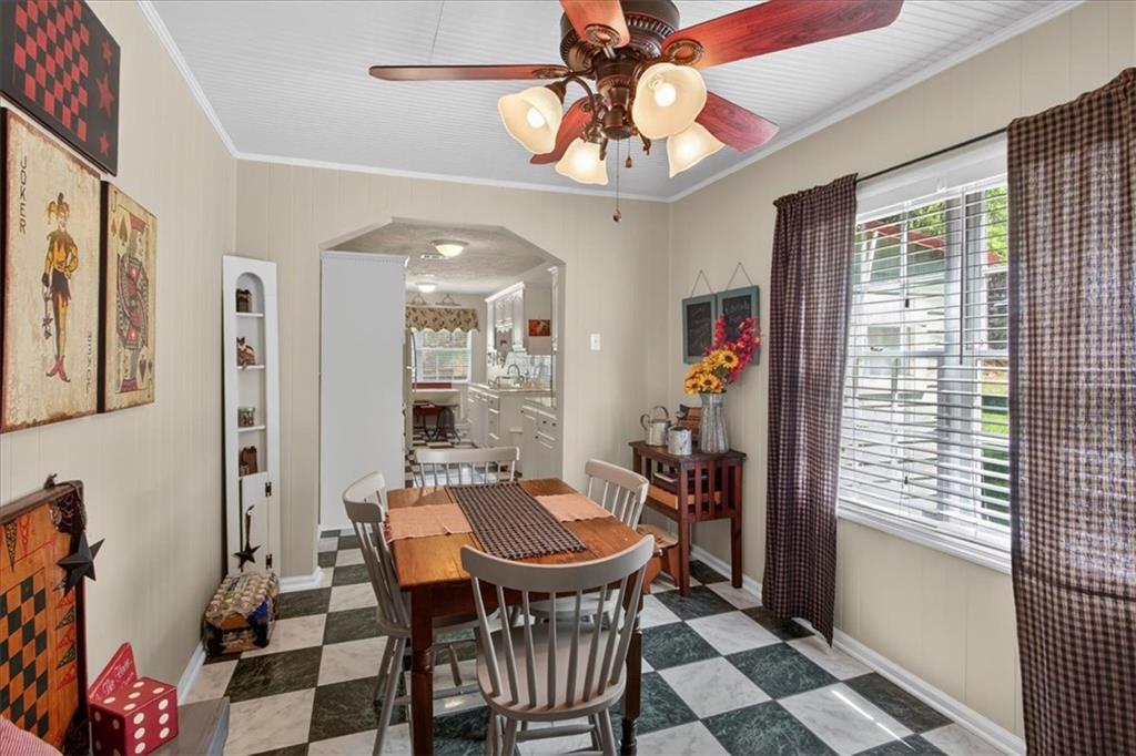 7433 Nicklesville Road Northeast Ranger, GA 30734 - Photo 21 of 53 a view of a dining room with furniture and a chandelier