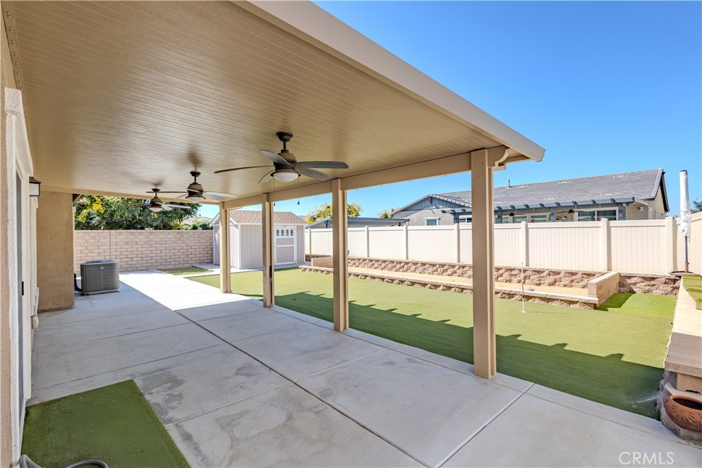 14337 Tansy Road Moreno Valley, CA 92555 - Photo 29 of 31 Actual image - Covered Patio with ceiling fans.