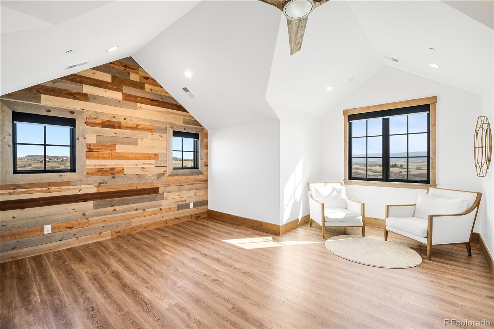 3148 Keep Drive Sedalia, CO 80135 - Photo 30 of 44 a living room with furniture and a large window