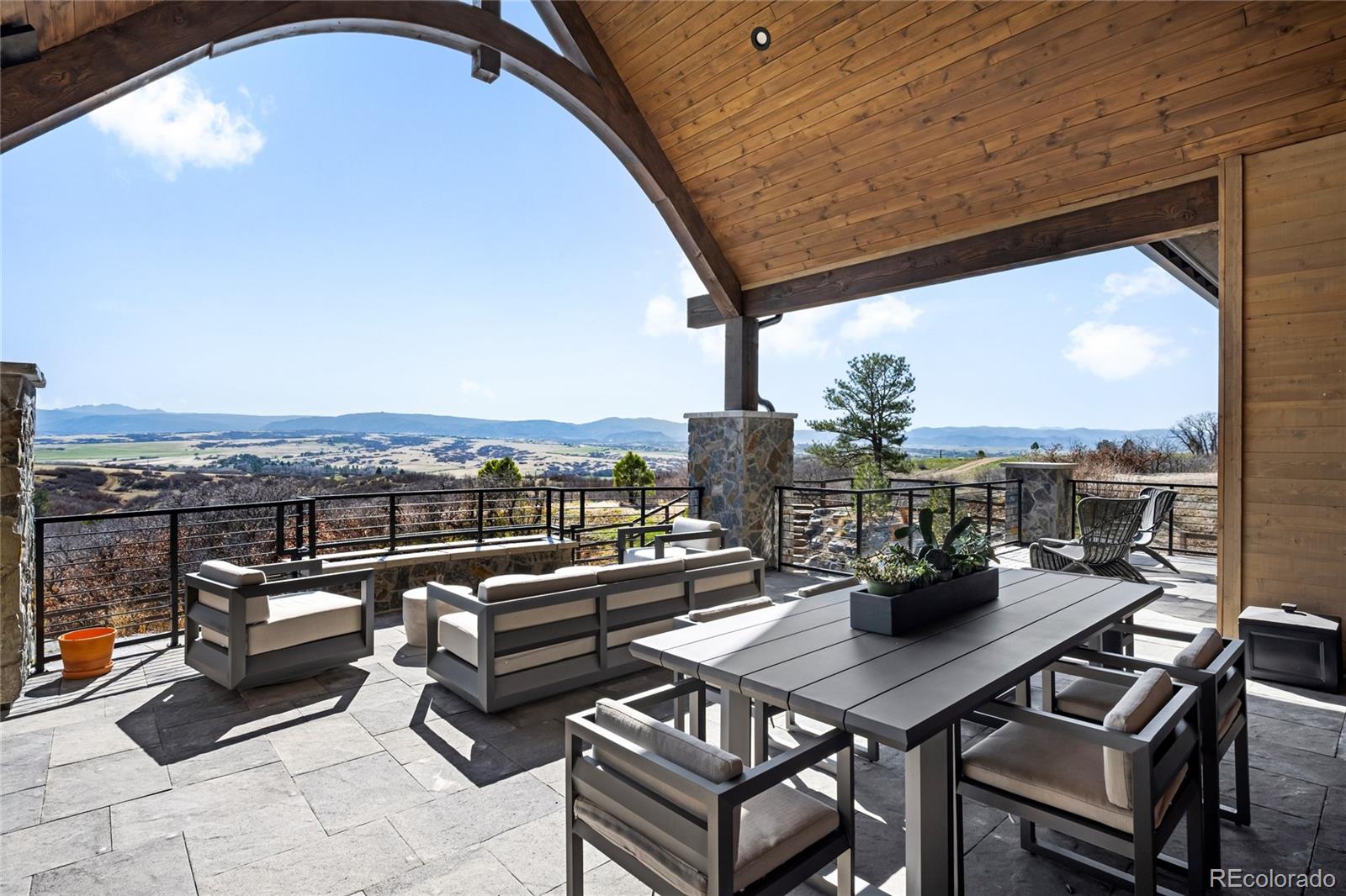 3148 Keep Drive Sedalia, CO 80135 - Photo 34 of 44 a view of a terrace with furniture and a terrace view