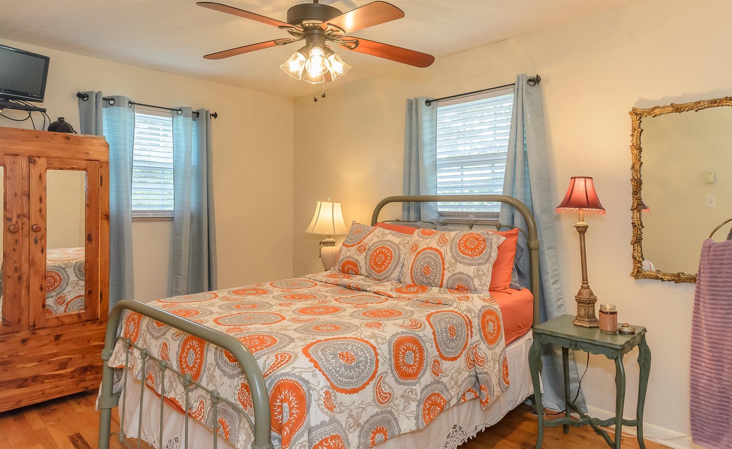 8321 Shelton Road Corryton, TN 37721 - Photo 12 of 28 a bedroom with a bed and a chandelier