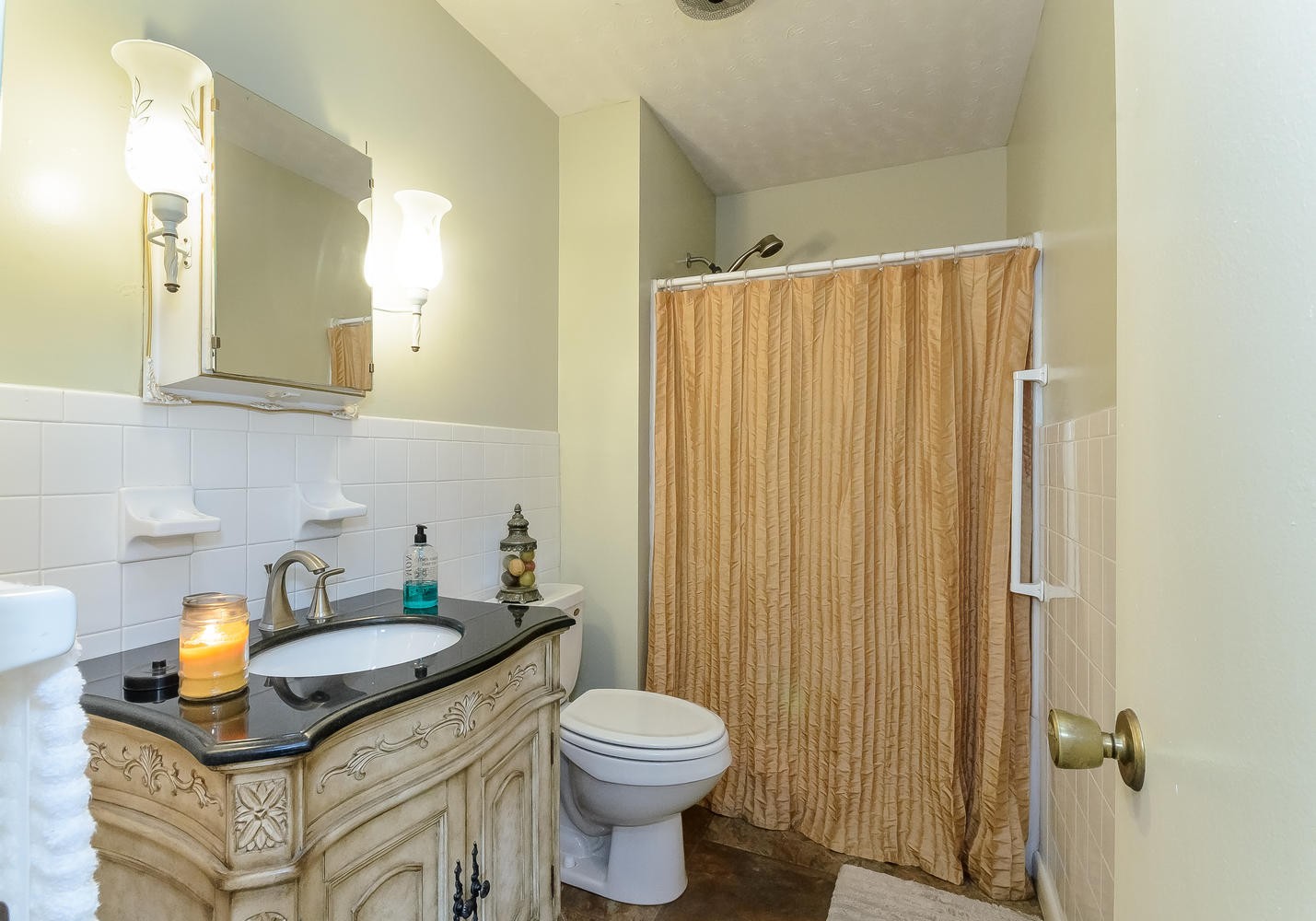 8321 Shelton Road Corryton, TN 37721 - Photo 13 of 28 a bathroom with a sink a toilet and shower