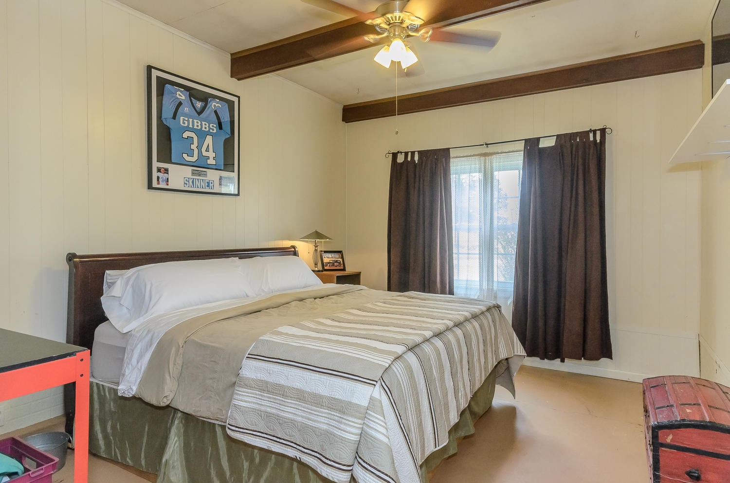 8321 Shelton Road Corryton, TN 37721 - Photo 16 of 28 a bedroom with a bed and a chandelier