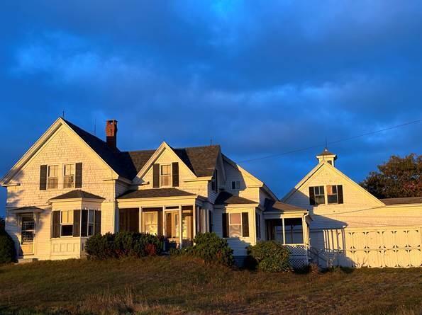 Front of house at sunset