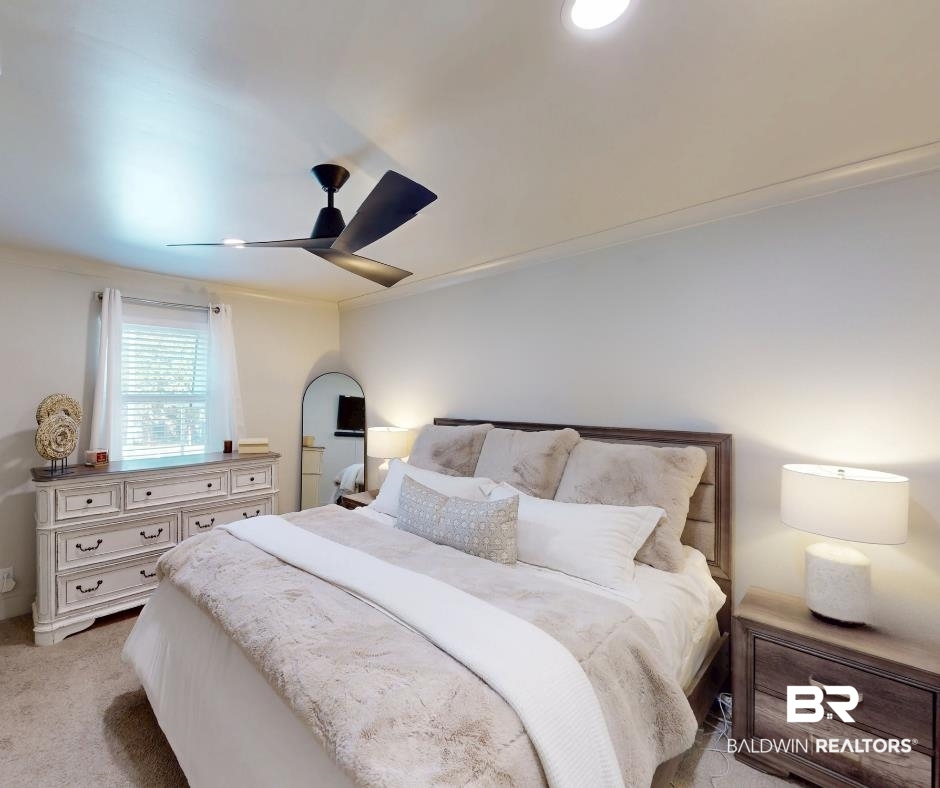 3655 Old Shell Road, Unit 211 Mobile, AL 36608 - Photo 7 of 17 Bedroom featuring ornamental molding, ceiling fan, and light colored carpet