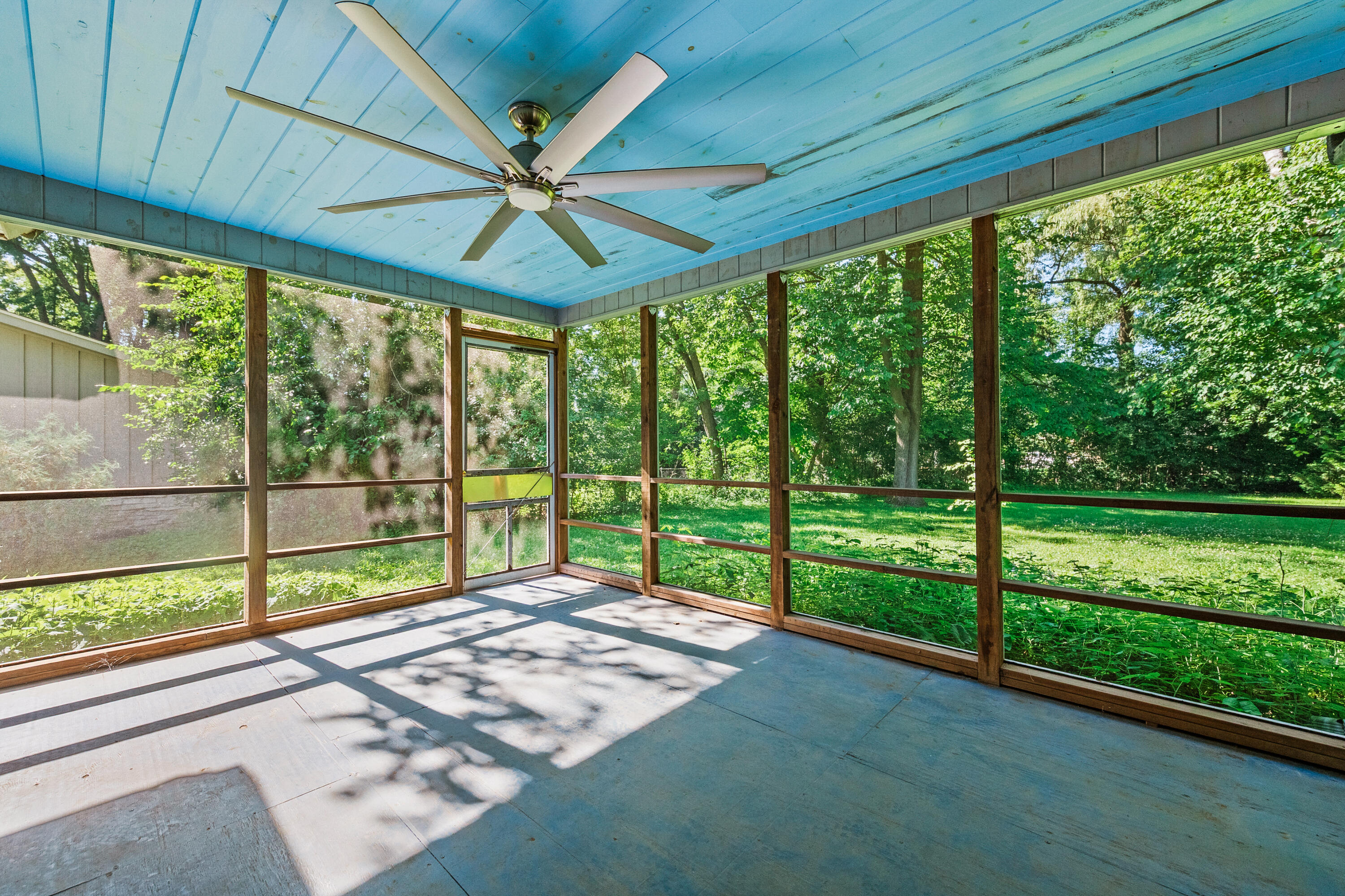 810 East Fairy Chasm Road Bayside, WI 53217 - Photo 15 of 45 View to back yard from screened room