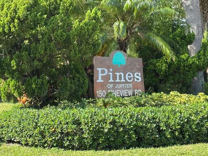 150 Pineview Road, Unit L6 Jupiter, FL 33469 - Photo 21 of 22 front view of a house with a yard