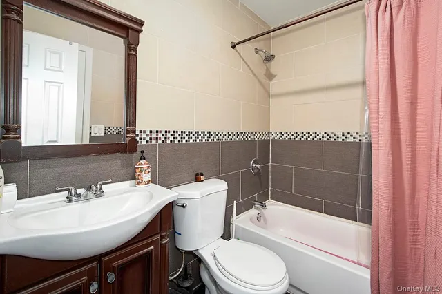 a living room with furniture kitchen view and a table