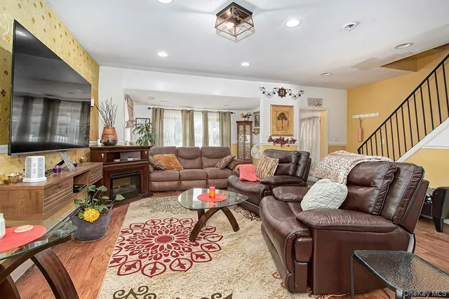 a kitchen with stainless steel appliances granite countertop a stove sink and cabinets