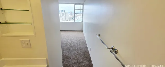 a view of a swimming pool with outdoor seating