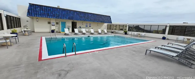 a view of a chairs and storage in a room