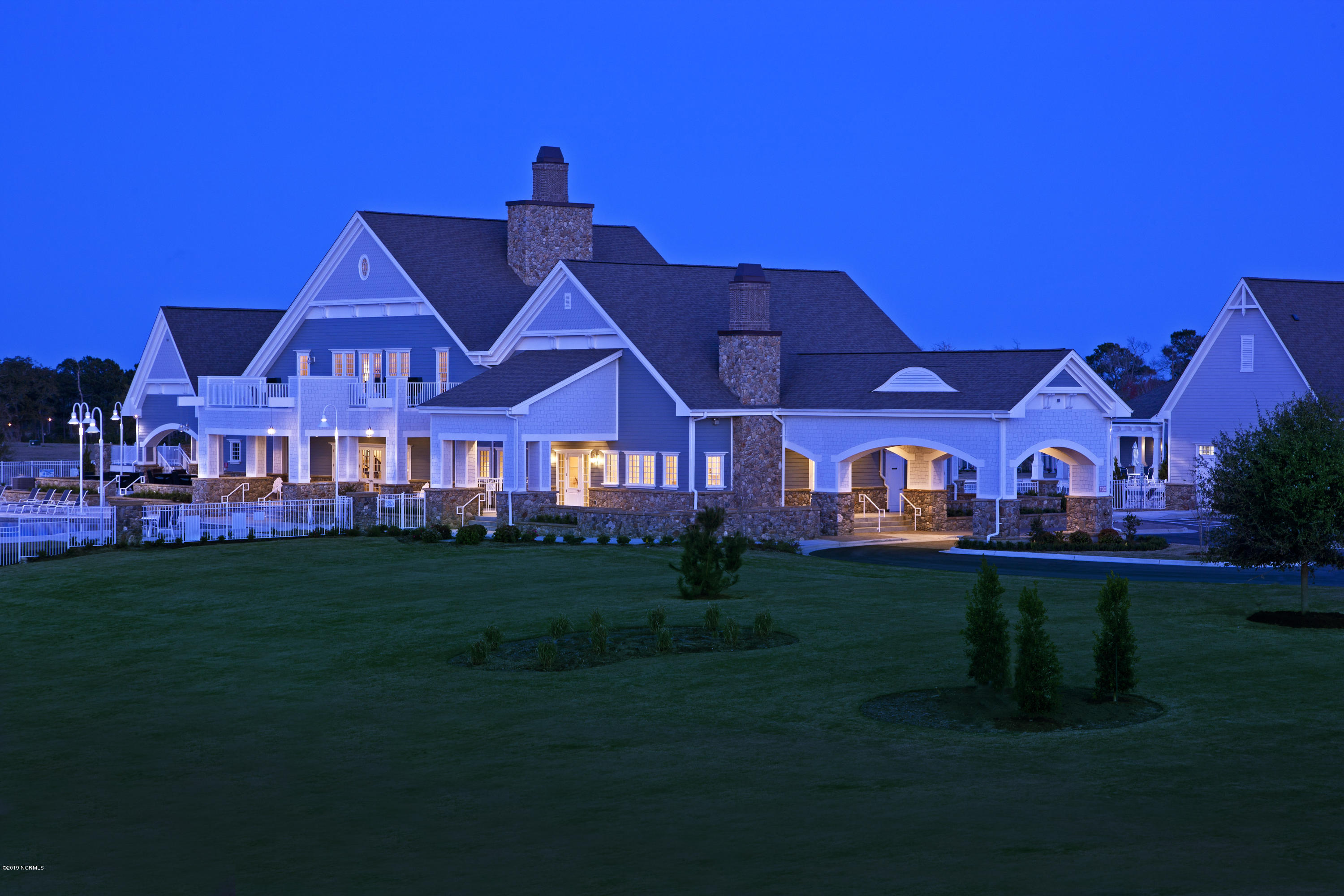 199 Everett Park Trail Holly Ridge, NC 28445 - Photo 1 of 8 Clubhouse Front