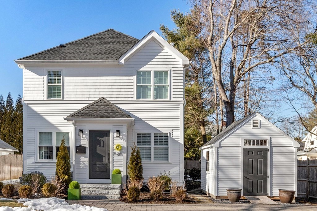23 Thomas Road Wellesley, MA 02482 - Photo 1 of 23 a front view of a house with a yard
