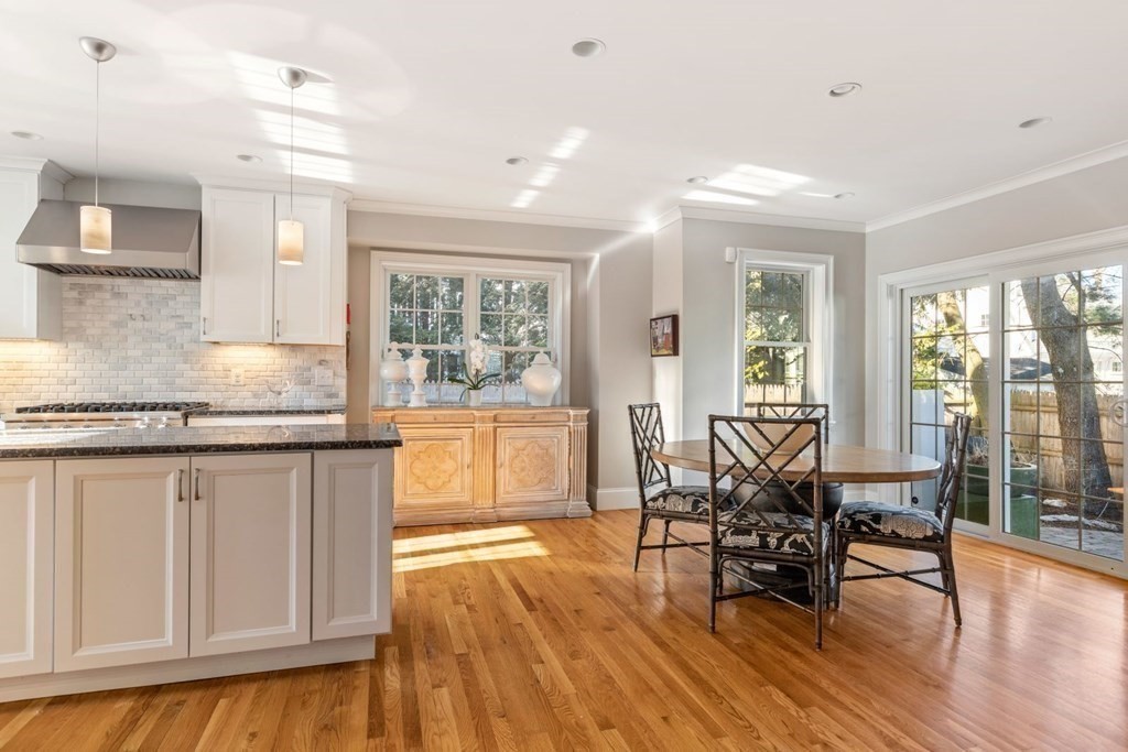 23 Thomas Road Wellesley, MA 02482 - Photo 11 of 23 a living room with granite countertop wooden floor table and chairs