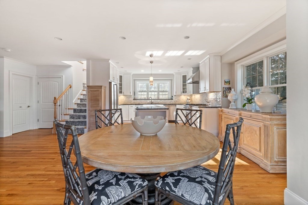 23 Thomas Road Wellesley, MA 02482 - Photo 12 of 23 a view of a dining room with furniture and wooden floor