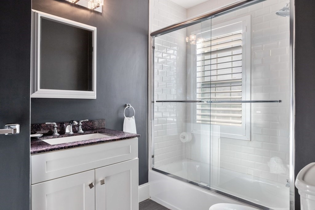 23 Thomas Road Wellesley, MA 02482 - Photo 13 of 23 a bathroom with a sink and a mirror