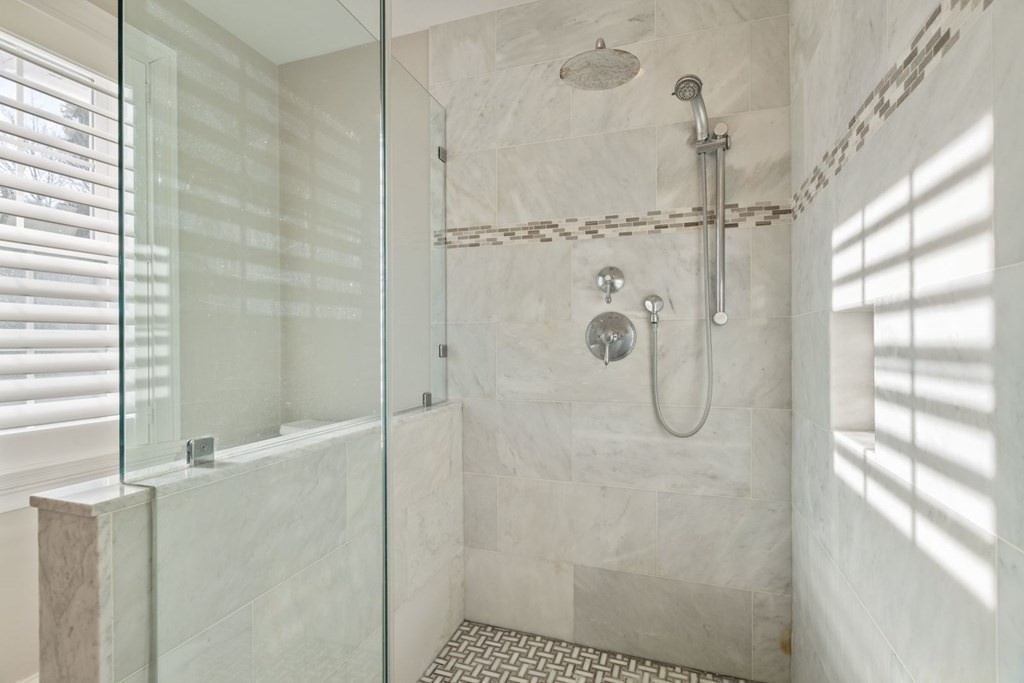 23 Thomas Road Wellesley, MA 02482 - Photo 17 of 23 a bathroom with a glass shower door