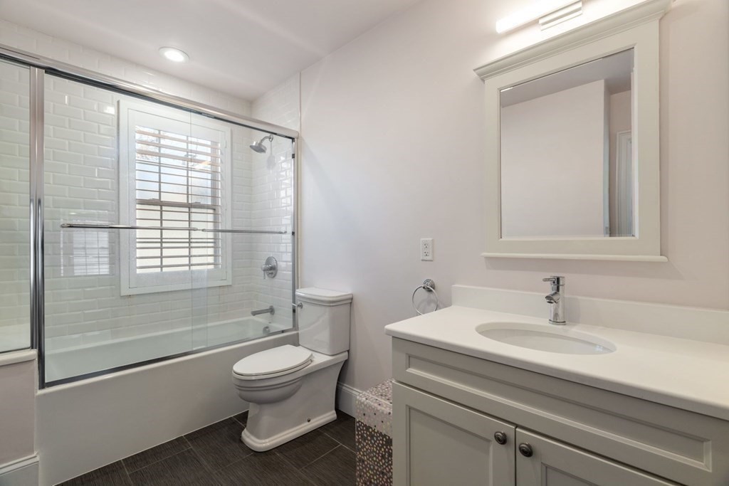 23 Thomas Road Wellesley, MA 02482 - Photo 18 of 23 a bathroom with a sink toilet and shower