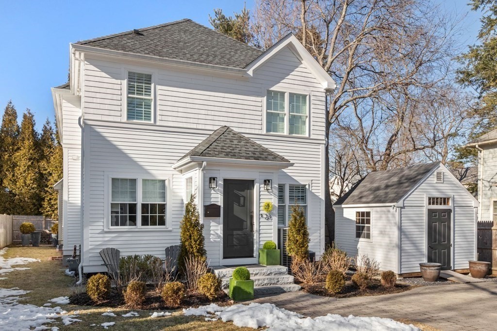 23 Thomas Road Wellesley, MA 02482 - Photo 2 of 23 a front view of a house with garden