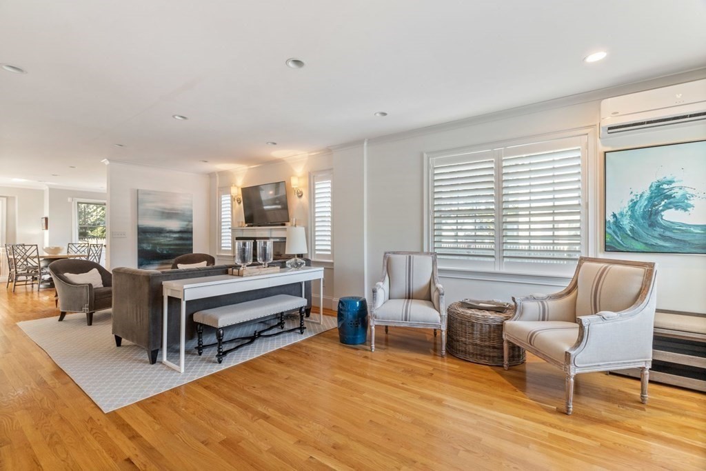 23 Thomas Road Wellesley, MA 02482 - Photo 4 of 23 a living room with furniture and a wooden floor