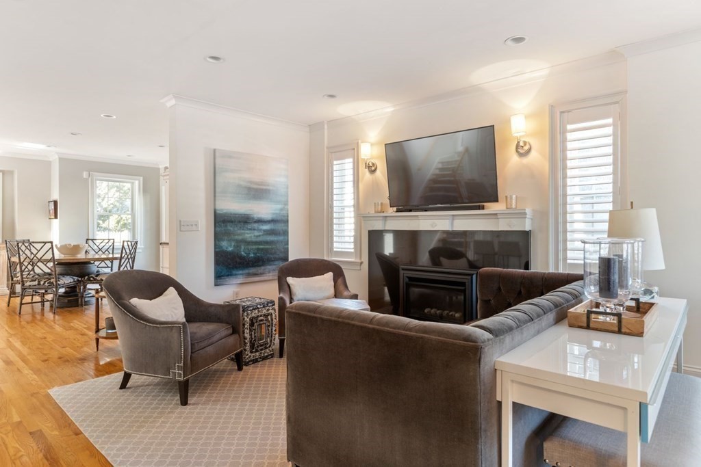 23 Thomas Road Wellesley, MA 02482 - Photo 5 of 23 a living room with furniture and a fireplace