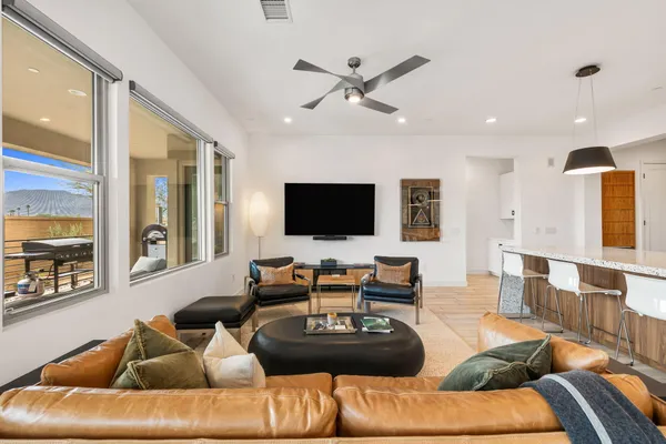 a bedroom with a bed and dresser