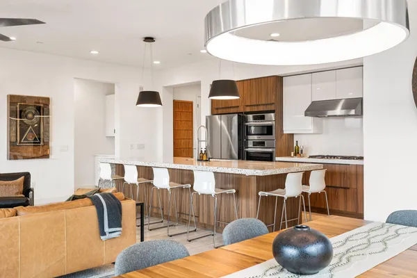 a living room with furniture and a table