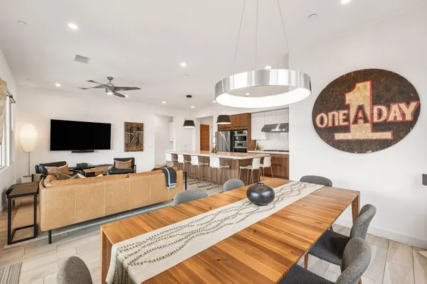 a bedroom with a bed and a flat screen television