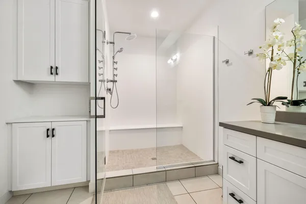 a bathroom with sinks and a mirror