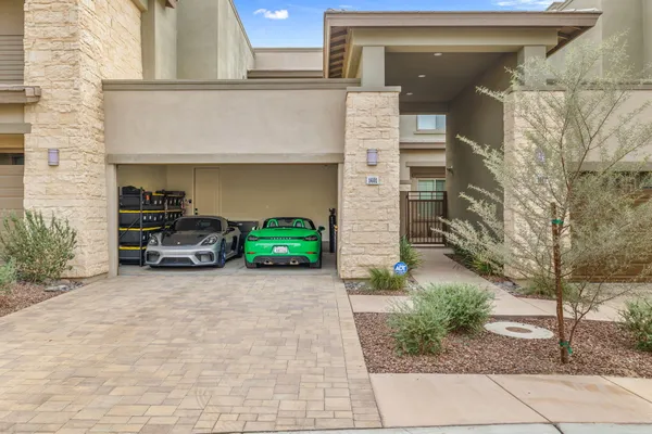 a view of a house with a small yard