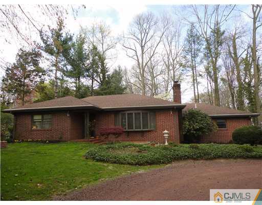 29 Davidson's Mill Road North Brunswick, NJ 08902 - Photo 1 of 1 a front view of a house with a garden and plants