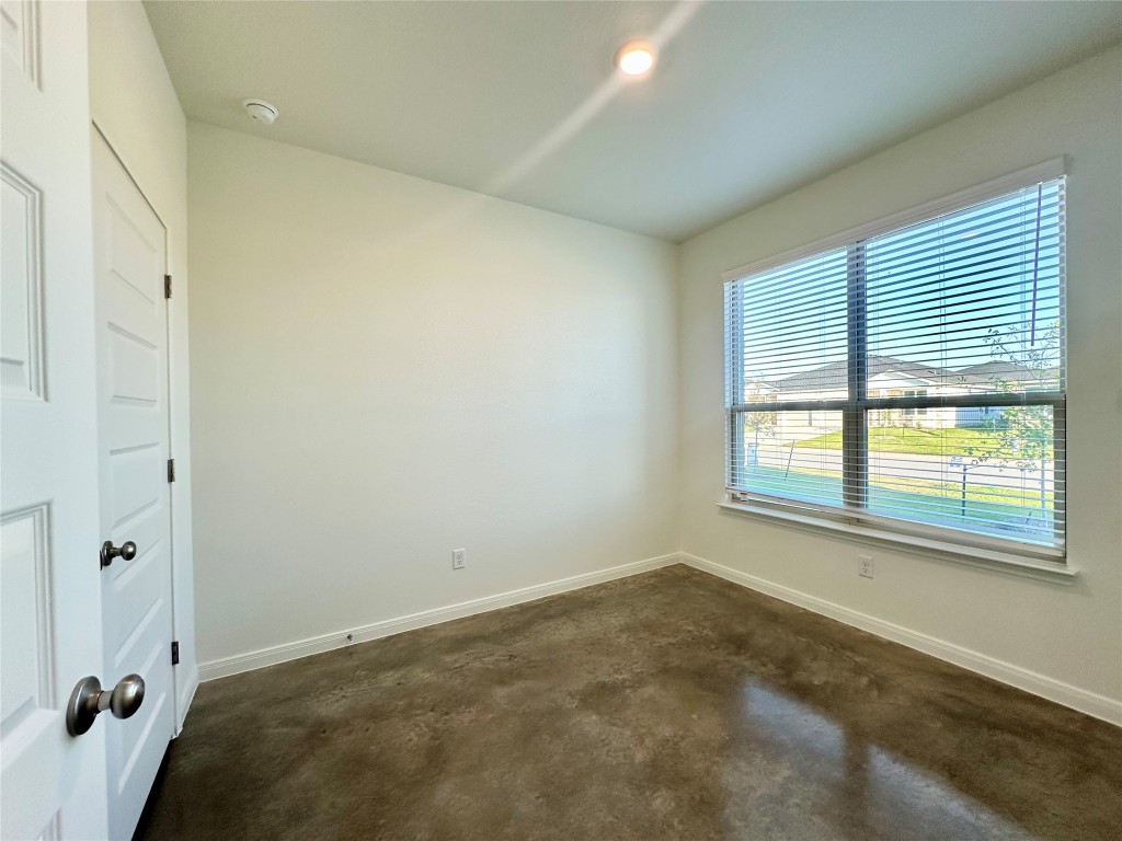 2913 Quail Rdg Lane, Unit B Temple, TX 76501 - Photo 6 of 20 Bedroom 1 with concrete flooring and baseboards