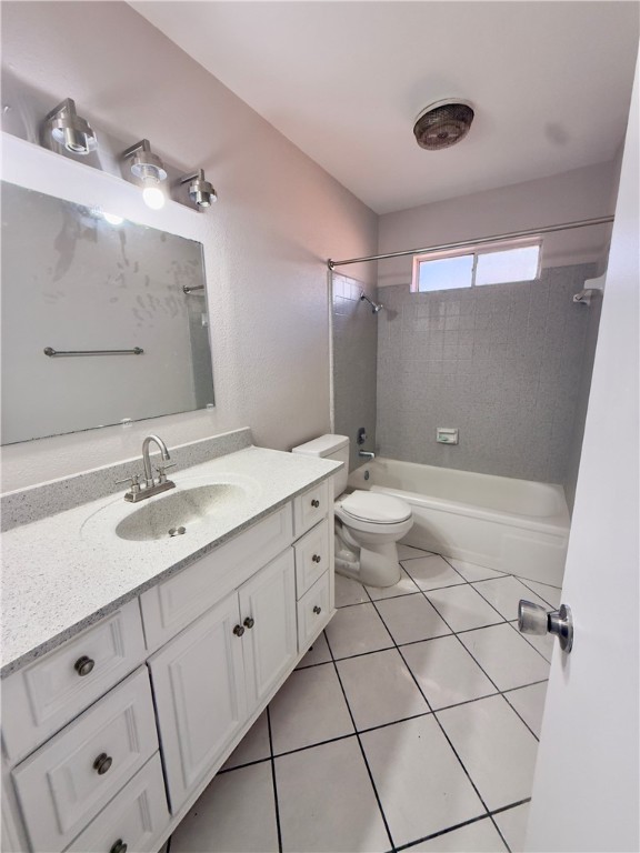 4006 Easy Street Corpus Christi, TX 78418 - Photo 6 of 8 a bathroom with a double vanity sink mirror and toilet