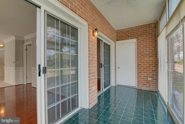 a view of a door and a room