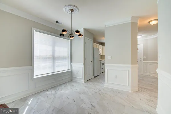 a view of an empty room and window