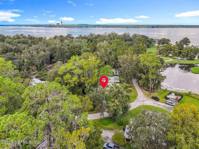 a view of a outdoor space with a lake view