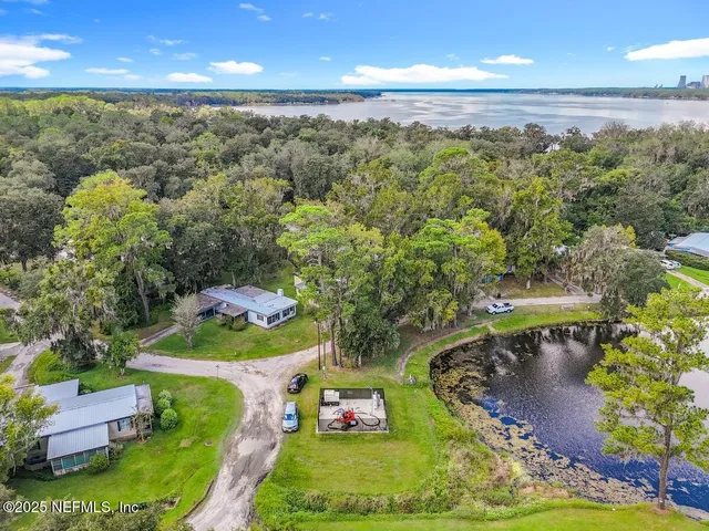 a view of a yard with an outdoor space