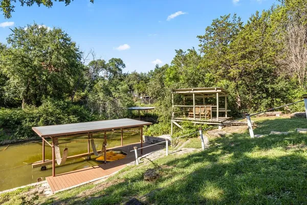 swimming pool with outdoor seating and yard