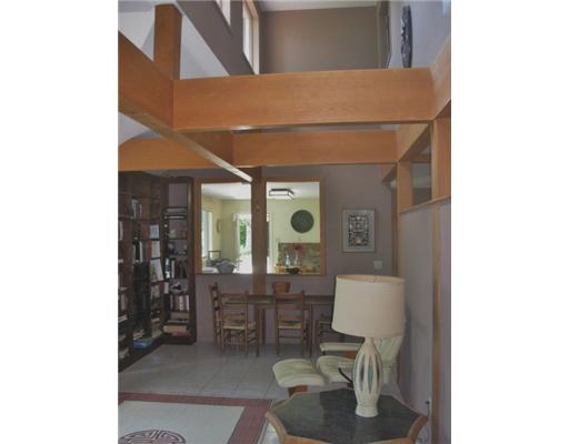 2630 Post Road South Kingstown, RI 02879 - Photo 3 of 20 Living Room. The liivng room has a white tile floor, a vaulted ceiling and and clerestory to bring in ots of southern light.