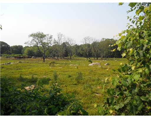 2630 Post Road South Kingstown, RI 02879 - Photo 4 of 20 View. The lot abuts acres and acres of farmland which can t be developed because of a conservtion easement.