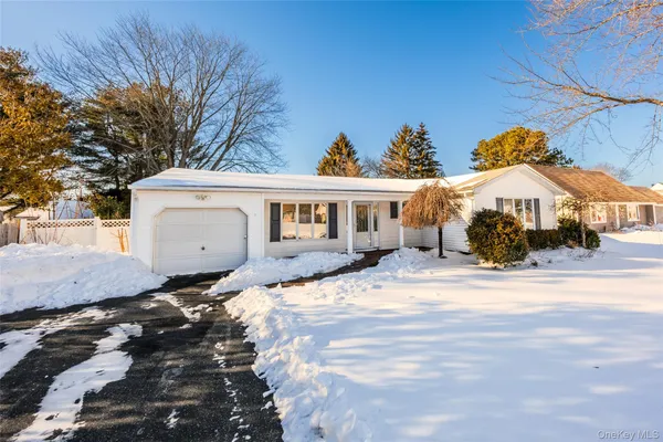 $499,900 | 18 Woodbrook Drive, Ridge, NY 11961