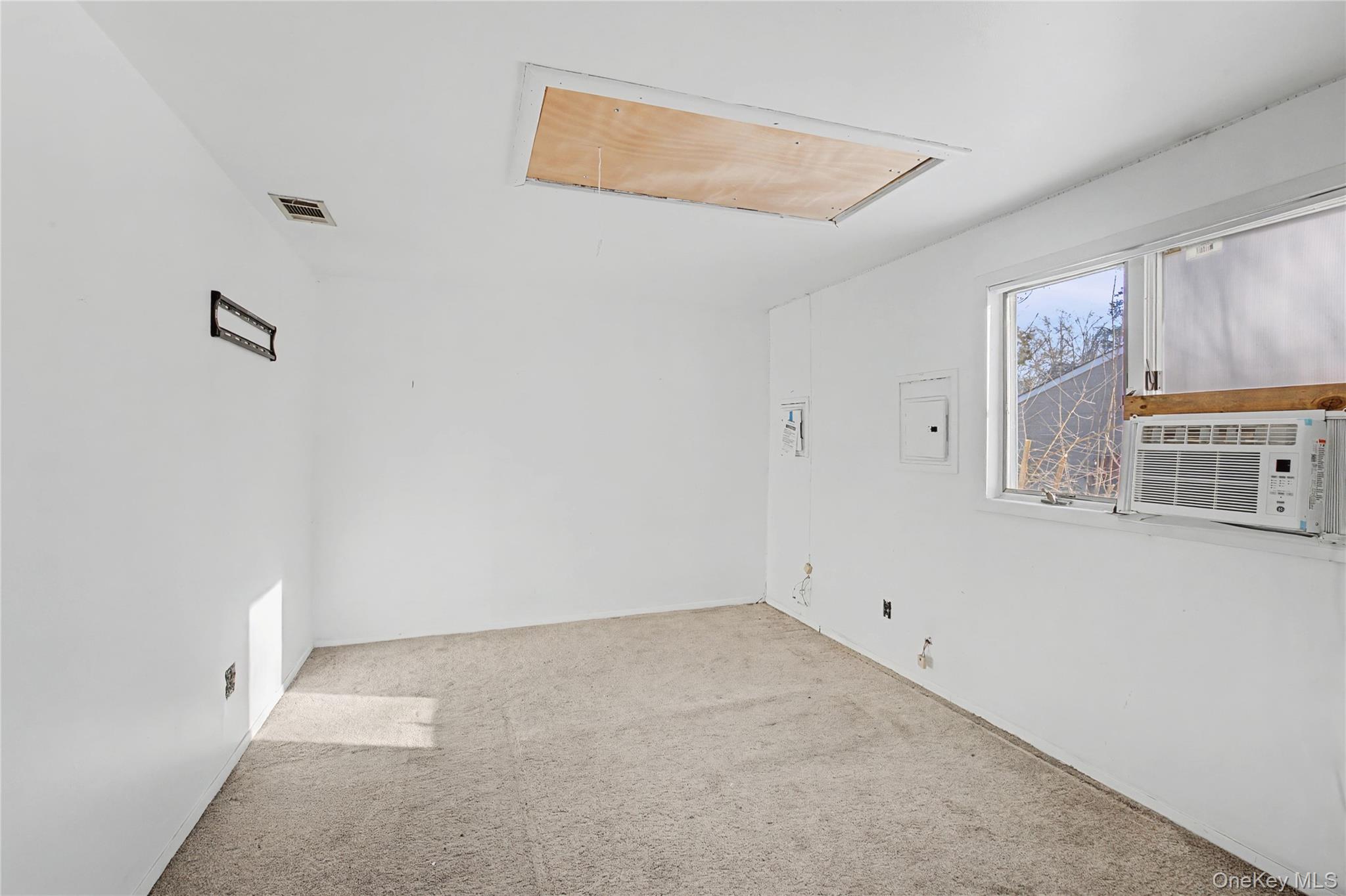 18 Woodbrook Drive Ridge, NY 11961 - Photo 21 of 33 a view of an empty room