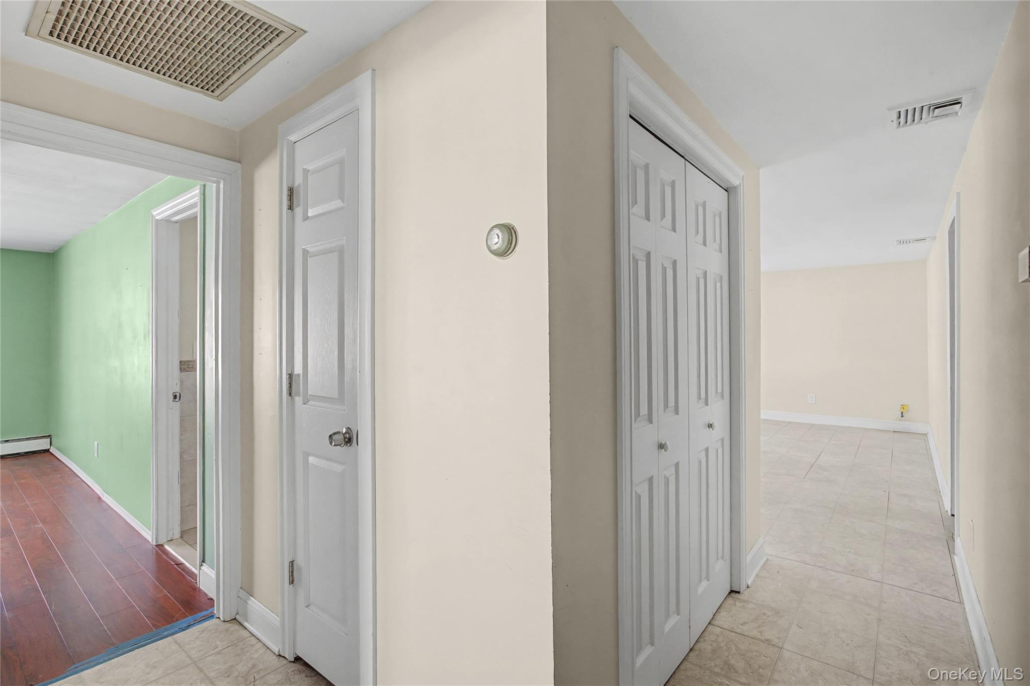 18 Woodbrook Drive Ridge, NY 11961 - Photo 24 of 33 a view of a hallway with a elevator
