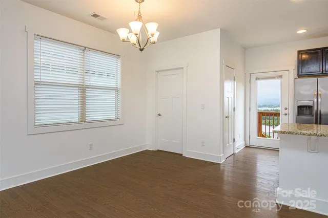 a view of livingroom with kitchen